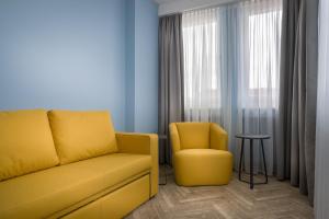 Posezení v ubytování Holiday Inn - the niu, Welly Kiel by IHG