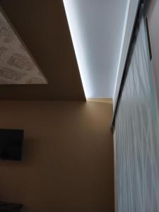 a skylight in the ceiling of a room at TWIN HOUSE brown in Tito