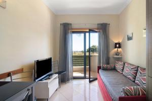 TV a/nebo společenská místnost v ubytování Apartamento T1 - Em zona tranquila