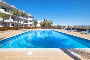 Bazén v ubytování Apartamento T1 - Em zona tranquila nebo v jeho okolí