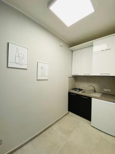 Kuchyň nebo kuchyňský kout v ubytování Casa 68 Ortigia