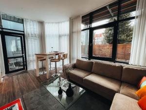 Posezení v ubytování Lieblingsapartment No.10 mit 2 Schlafzimmern und eigener Terrasse