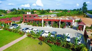 an aerial view of a parking lot in front of a building at Dreamwood suites Mbarara in Mbarara