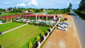 an aerial view of a resort with cars parked in front at Dreamwood suites Mbarara in Mbarara