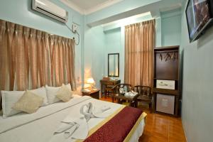 Giường trong phòng chung tại 79 Living Hotel