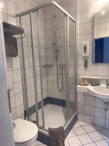 Koupelna v ubytování Strandhotel Berg