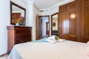Łóżko lub łóżka w pokoju w obiekcie Vistas Montealto Amplio 3 rooms 2 baños
