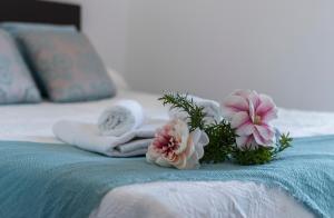 Łóżko lub łóżka w pokoju w obiekcie Vistas Montealto Amplio 3 rooms 2 baños