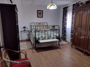 Posteľ alebo postele v izbe v ubytovaní Casa Rural El Rincón del Valle