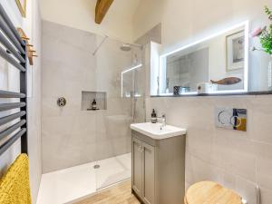 a bathroom with a sink and a shower at The Hemmel - Uk43357 in Branxton