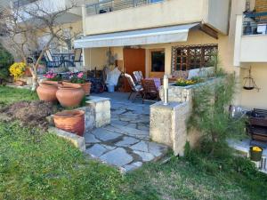 Zahrada ubytování Στουντιο στο Πανοραμα