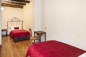 Cama o camas de una habitación en Apartaments Els Llacs
