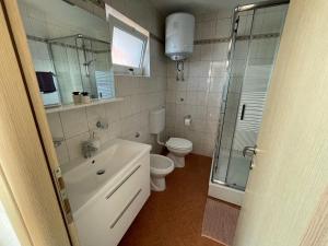Koupelna v ubytování Apartments Elvira