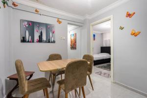 a dining room with a table and chairs at Central Istanbul Apartments in Istanbul