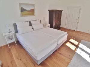 Posteľ alebo postele v izbe v ubytovaní Maria Theresia Berghaus Apartments