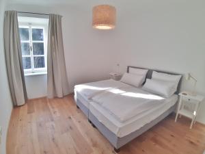 Posteľ alebo postele v izbe v ubytovaní Maria Theresia Berghaus Apartments