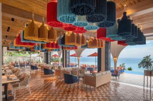 Ein Restaurant oder anderes Speiselokal in der Unterkunft Hyatt Regency Phuket Resort 