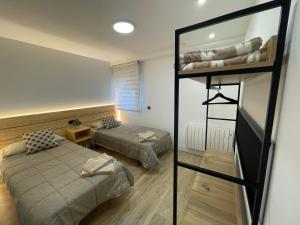 Postel nebo postele na pokoji v ubytování VillaPejina
