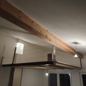 a wooden beam on the ceiling of a room at Alextra in Ependes