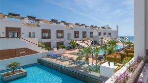 an image of a resort with a swimming pool at Belmar Spa & Beach Resort in Lagos