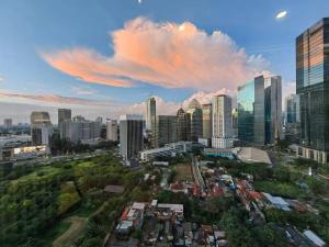 an aerial view of a city with tall buildings at Senopati Penthouse Luxury 2 Bedroom Full Furnished SCBD Area in Jakarta