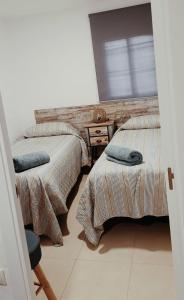Llit o llits en una habitació de Tarancon Suite Exclusivo