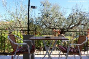 A balcony or terrace at Rentoulia Apartments