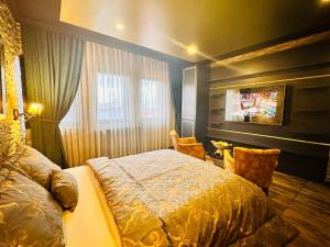 Un pat sau paturi într-o cameră la GOLDEN ROCK HOUSE
