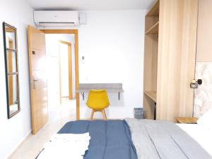 A bed or beds in a room at Habitaciones Barra89