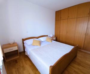 Postel nebo postele na pokoji v ubytování Apartment Katarina