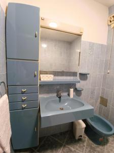 a bathroom with a sink and a toilet at Apartment Katarina in Split