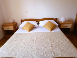 Postel nebo postele na pokoji v ubytování Apartment Katarina