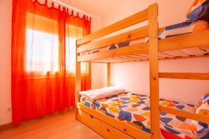 Postel nebo postele na pokoji v ubytování Empuriabrava Apartaments nº6