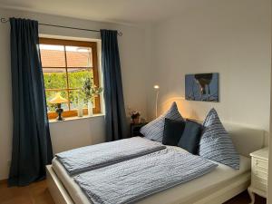Postel nebo postele na pokoji v ubytování Elb Nest Gästehaus