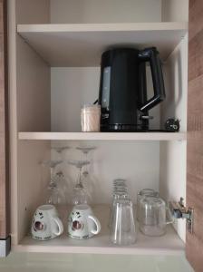 Kuchyň nebo kuchyňský kout v ubytování DC Ghencea 158 Self Check-in + 30 fotografií