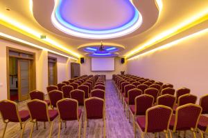 a room with a bunch of chairs and a ceiling at Telmessos Neva Hotel - Halal-Non Alcoholic All Inclusive-Muhafazakar Hotel in Oludeniz +79 photos