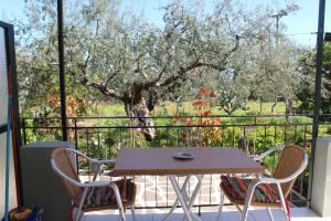 A balcony or terrace at Rentoulia Apartments
