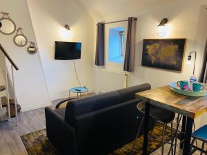 Μια τηλεόραση ή/και κέντρο ψυχαγωγίας στο Le duplex Saint Gilles centre ville Baie de Somme