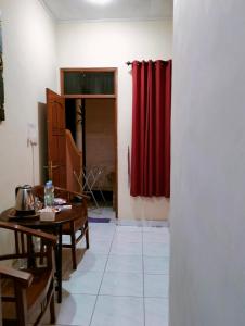 Posezení v ubytování Kaia Lovina Guest House