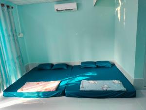 Katil atau katil-katil dalam bilik di Homestay view đồi Hòn Sơn