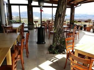 Ресторант или друго място за хранене в Vesuvio Inn Guest House e Wine Experience