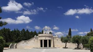 a building with a statue on top of it at Ribeiro Hotel in Fátima