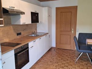 Kuchyň nebo kuchyňský kout v ubytování Apartment Fichte by Interhome