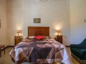 Ένα ή περισσότερα κρεβάτια σε δωμάτιο στο Apartment Fattoria Petraglia - Terrazza by Interhome