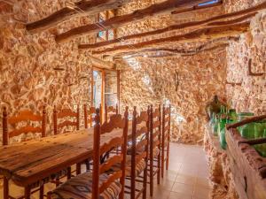 A restaurant or other place to eat at Holiday Home Can Xerret by Interhome