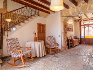 A seating area at Holiday Home Can Xerret by Interhome Még 32 kép