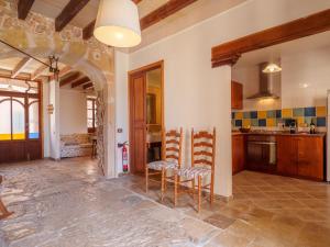 A kitchen or kitchenette at Holiday Home Can Xerret by Interhome