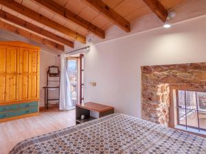 A bed or beds in a room at Holiday Home Can Xerret by Interhome