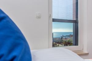 Posteľ alebo postele v izbe v ubytovaní Apartments LUCA
