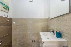 Kúpeľňa v ubytovaní Apartments LUCA